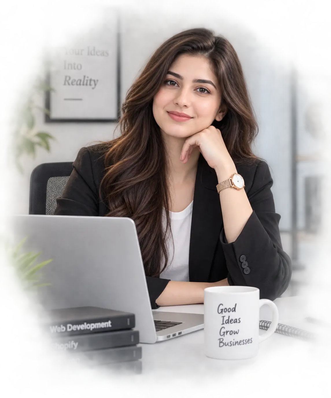 Maria Nawaz, freelance digital professional, working at her desk with a laptop